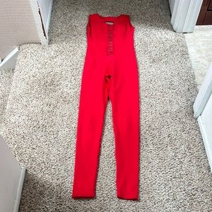 Mika body suit. Open back slit front.bright red size M